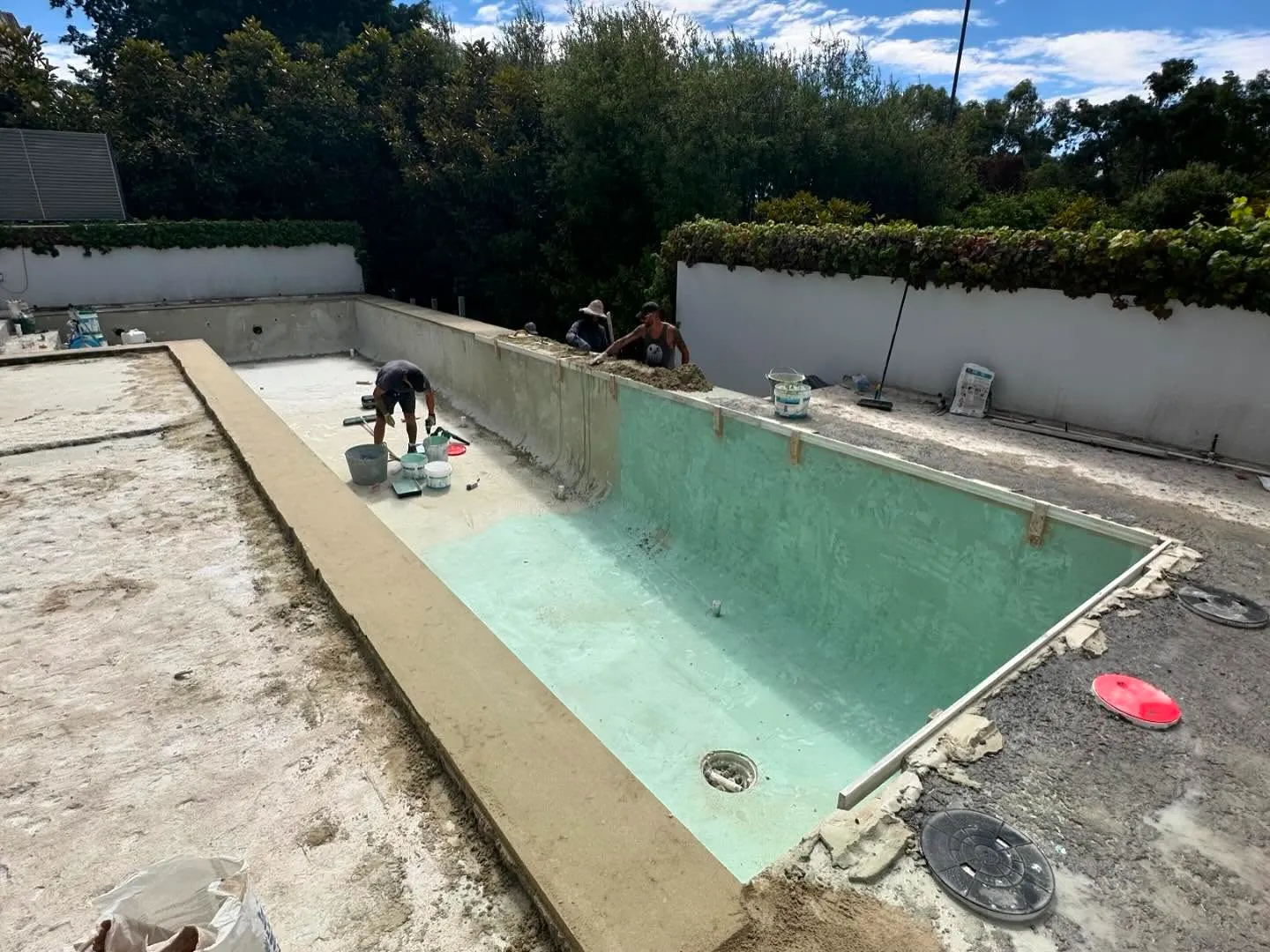mosaic tiled concrete pool in forrest 4